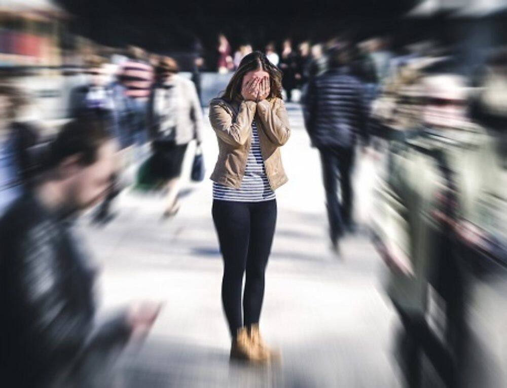 Woman covering face in distress, surrounded by blurred crowd, depicting anxiety and isolation associated with opiate addiction|Confident mature male doctor with grey hair and beard, wearing white coat and stethoscope, standing with arms crossed in a medical facility|Image showing a sign with text: "Unfortunately, 33% of painkiller users don't know they're taking opioids. Common names include hydrocodone, oxycodone and vicodin." A prescription bottle is visible in the foreground.|Infographic comparing relapse rates in addiction treatment: Buprenorphine treatment shows 20.7% relapse rate, while abstinence-based treatment shows 43.7% relapse rate. Visual representation using human figures illustrates the difference in effectiveness.|Bar graph showing 5-year outcomes after addiction treatment, comparing less than 6 months vs more than 6 months in treatment. Metrics include cocaine use, problem alcohol use, suicidal thoughts/attempts, and full-time work rates.