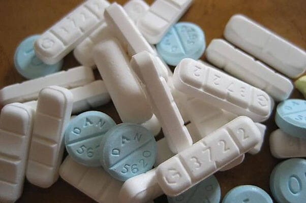 Various prescription pills and tablets used in drug and alcohol addiction treatment and detox programs||Comparison image showing a real Xanax pill on the left (gray background) and a fake Xanax pill on the right (red background). The real pill has clear, defined edges and markings, while the fake pill appears smoother and less defined|Infographic detailing Xanax use and abuse, including its definition, mechanism of action, addiction risks, withdrawal symptoms, and treatment options. Highlights side effects and dangers of Xanax misuse.